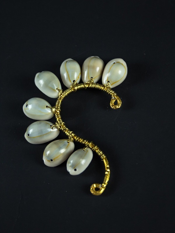 Bijou d'oreille en cauris